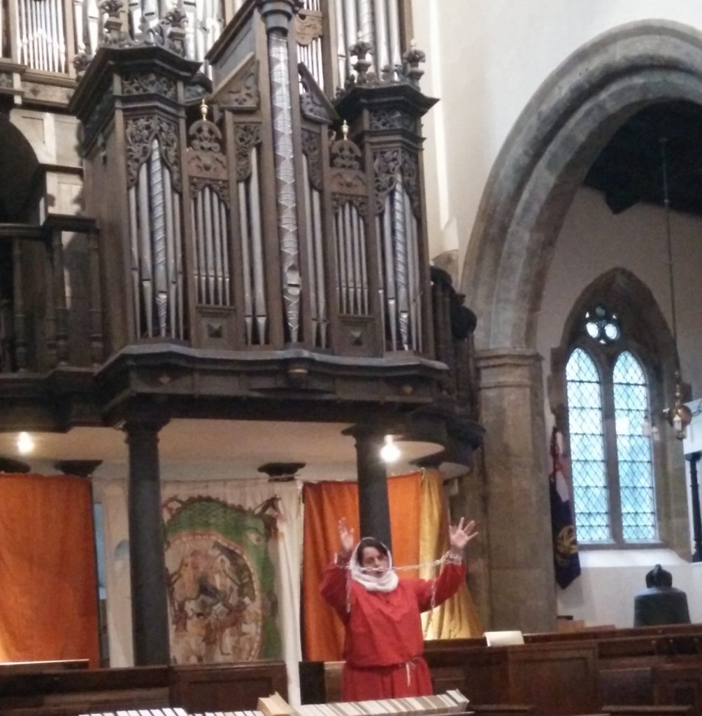 Anglo-Saxon Harrowing of Hell_St. Oswald's Church, Durham, 2016. Eve (Helen Barber) in chains before Hell. Photo: Mike Huxtable.